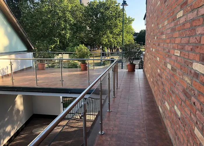 Castellum Apartmanhaz Couette-café